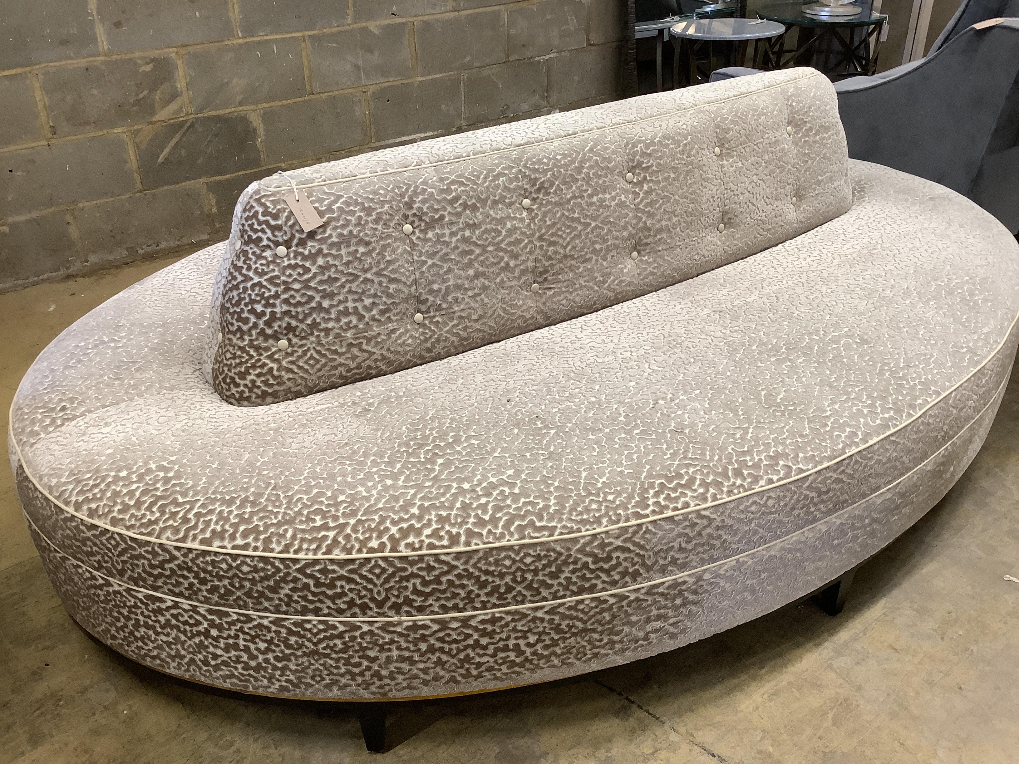 A Bray Design conversation sofa with brass trim, upholstered in Zimmer & Rohde vermicelli velvet, width 240cm, depth 160cm, height 84cm
